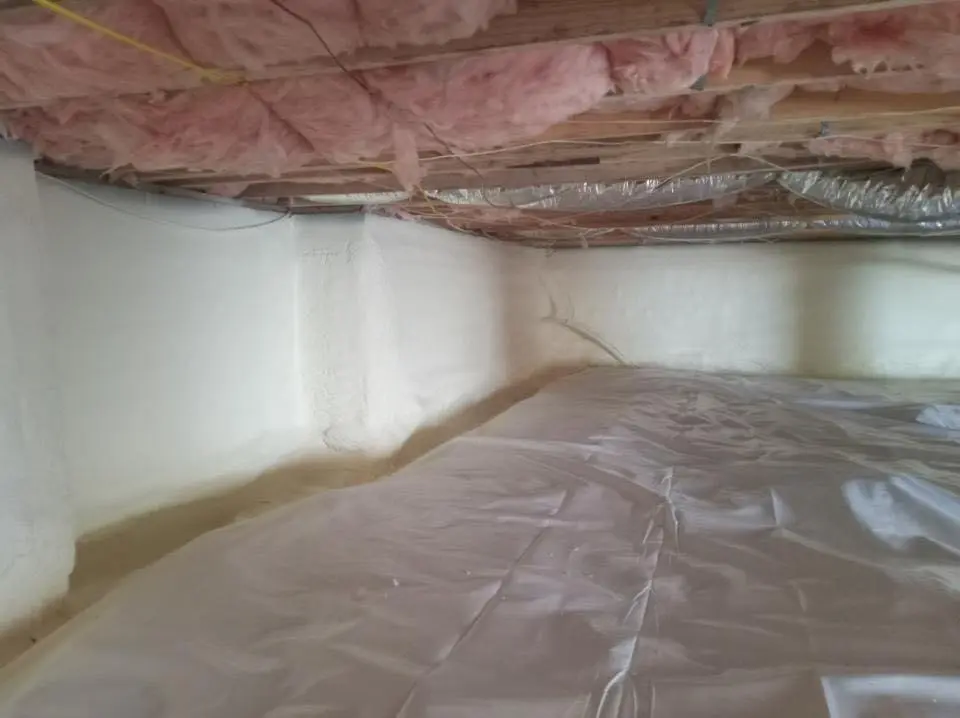Crawl space encapsulation with closed-cell spray foam for Storm Damage Roof Repair in Pittsfield
